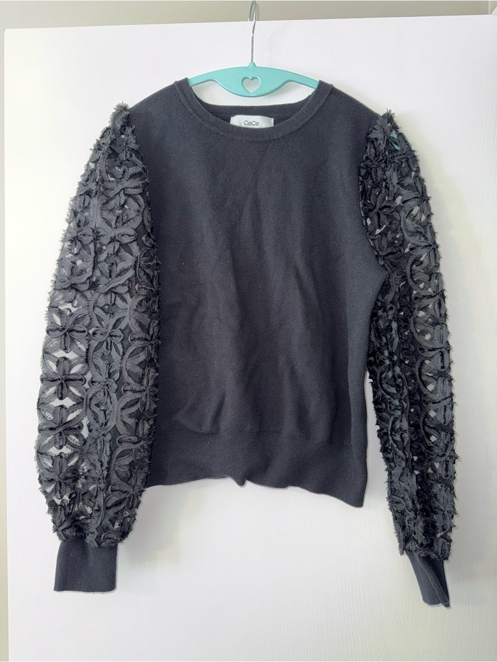 CeCe sweater with floral puff sleeves